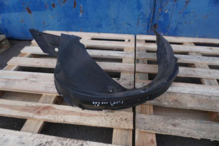 SUZUKI SX4 NADKOLE PRZEDNIE LEWE 72322-79J0
