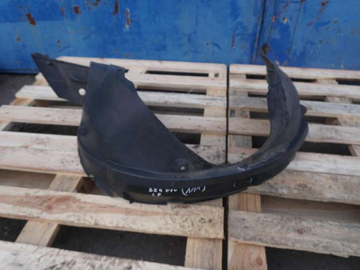 SUZUKI SX4 NADKOLE PRZEDNIE LEWE 72322-79J0