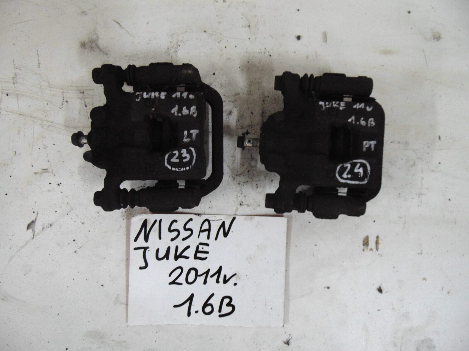 Nissan Juke F15 Zacisk Hamulcowy Tylny 1.6b