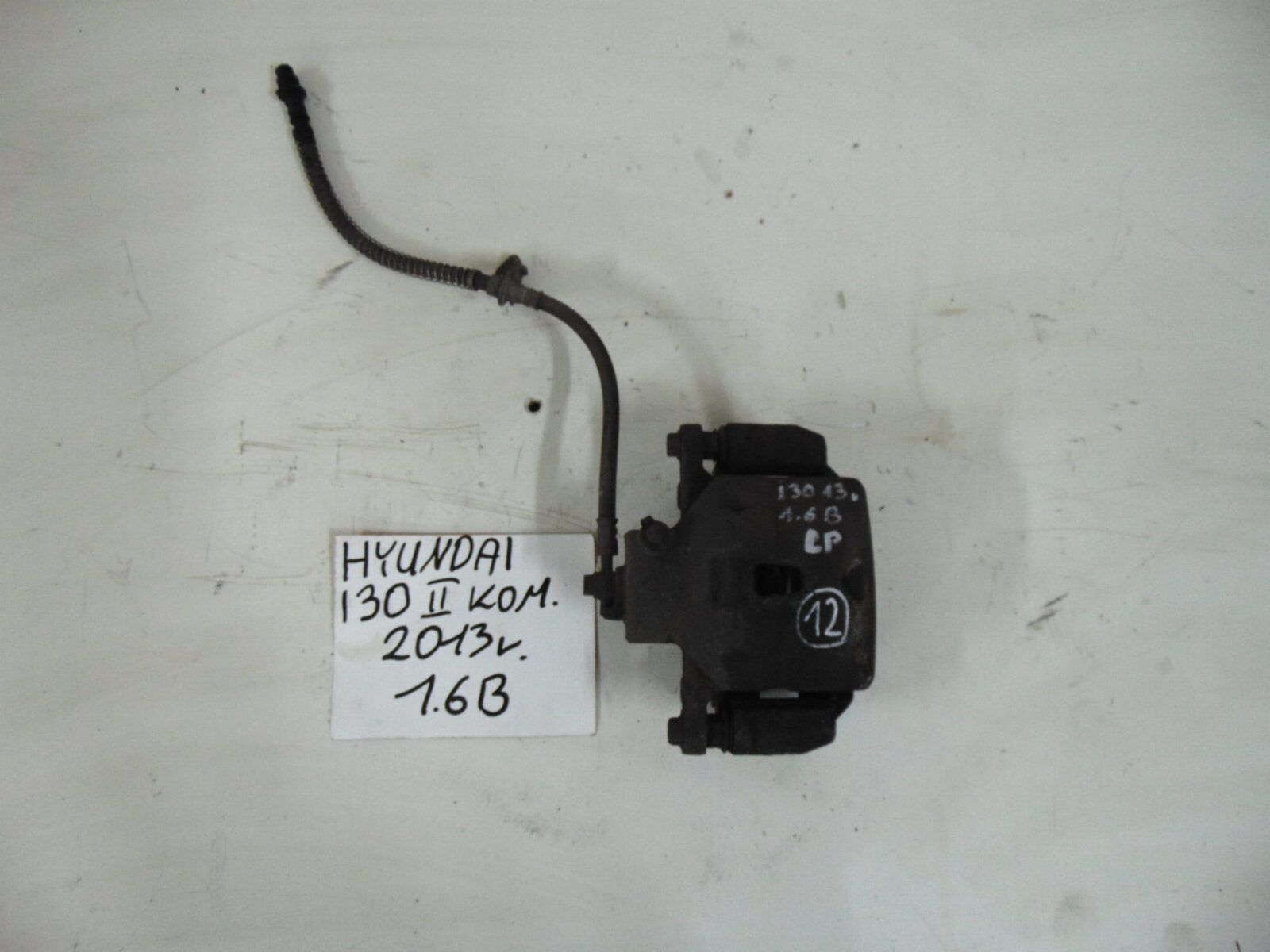 Hyundai I30 II Gd Zacisk Hamulcowy Lewy Przedni Nr.12