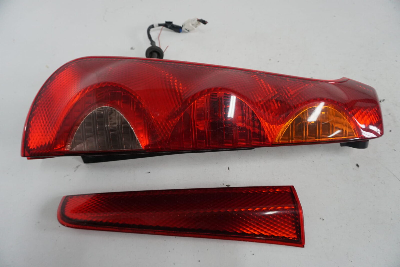 Nissan Note E11 Lampa Tylna Lewa Nr.111