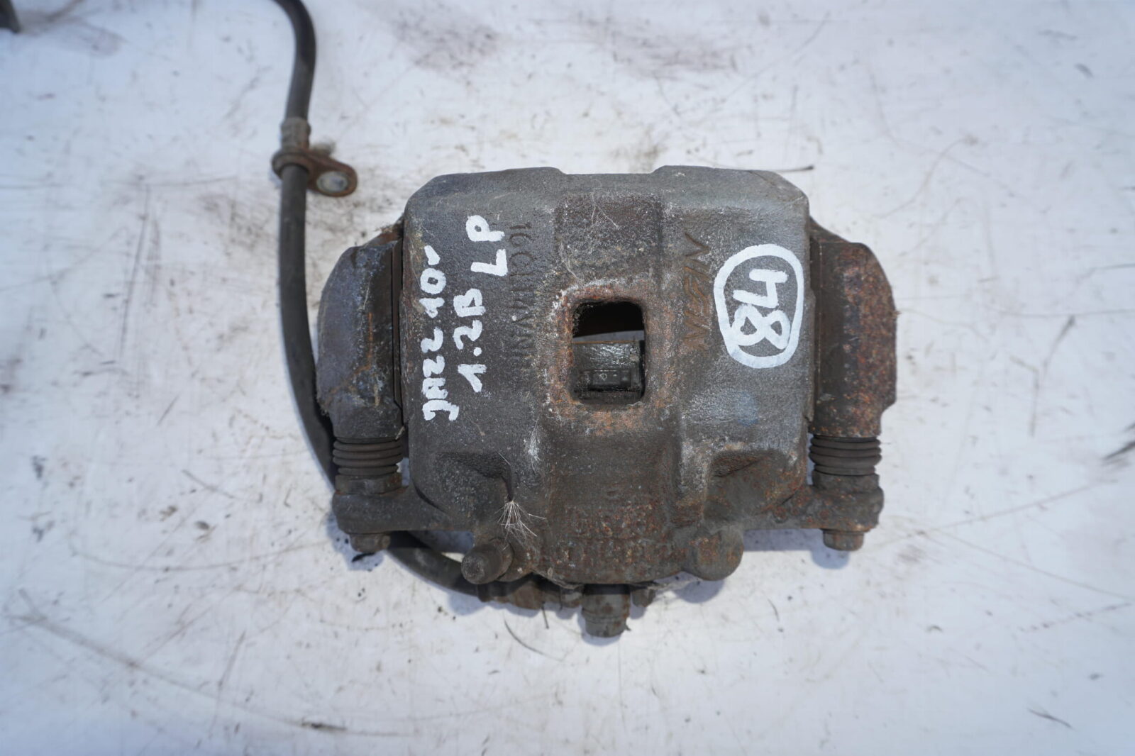 Honda Jazz III 2010r Zacisk Lewy Przód