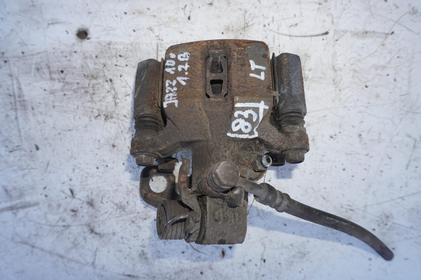 Honda Jazz III 2010r 1.2b Zacisk Hamulcowy Lewy Tył