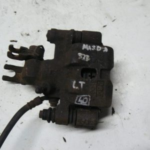 Mazda 323 1998 2003r Zacisk Hamulcowy Tylny Lewy