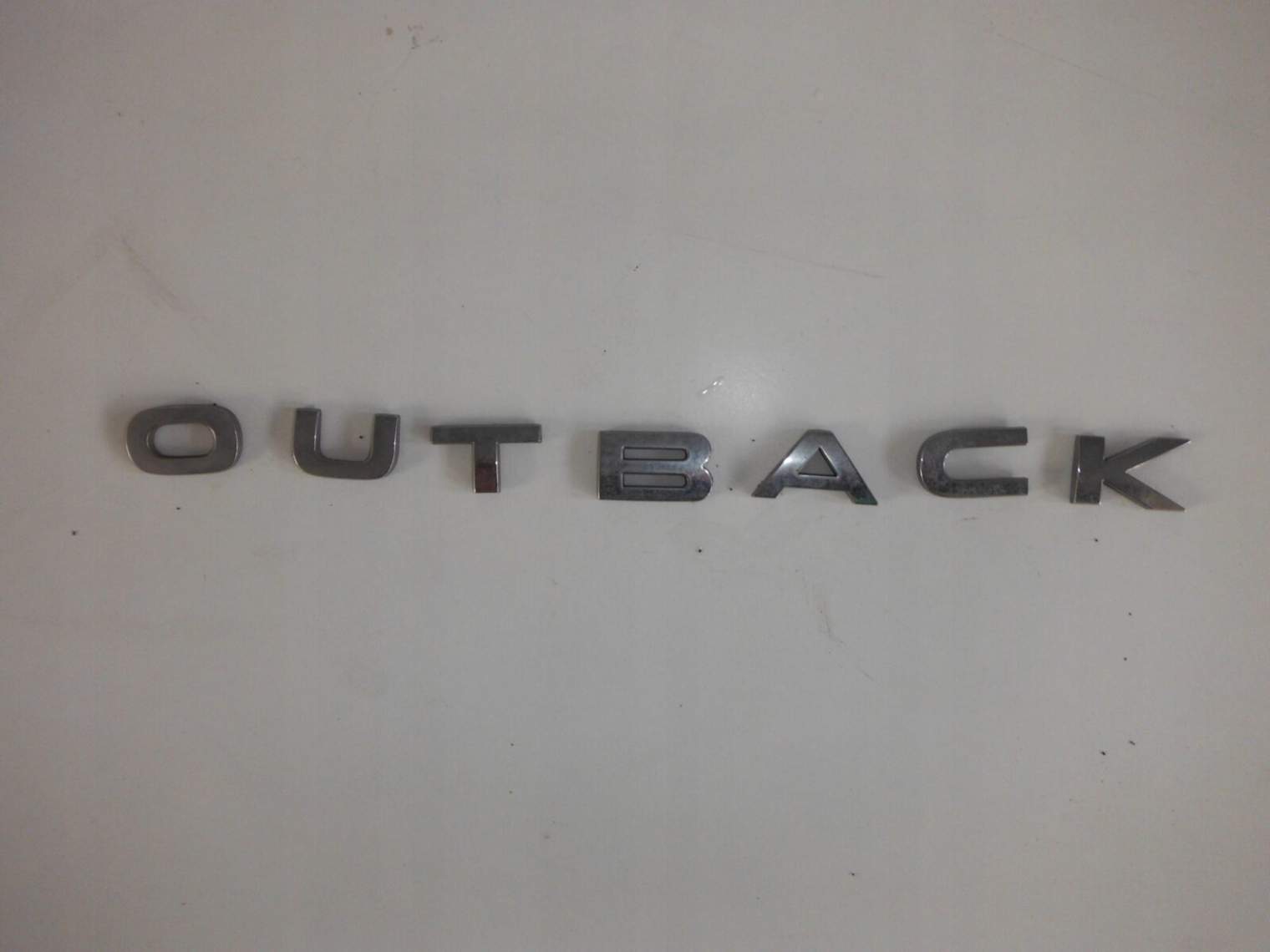 Subaru Outback IV V Znaczek Znak Logo Emblemat