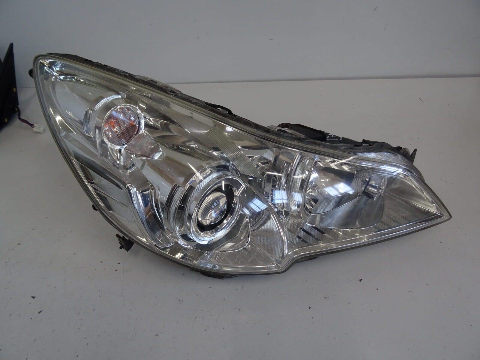 Subaru Legacy V Outback IV Lampa Prawa Xenon Nr.62