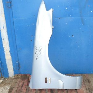Mazda 626 2000 2001r Błotnik Prawy Przedni