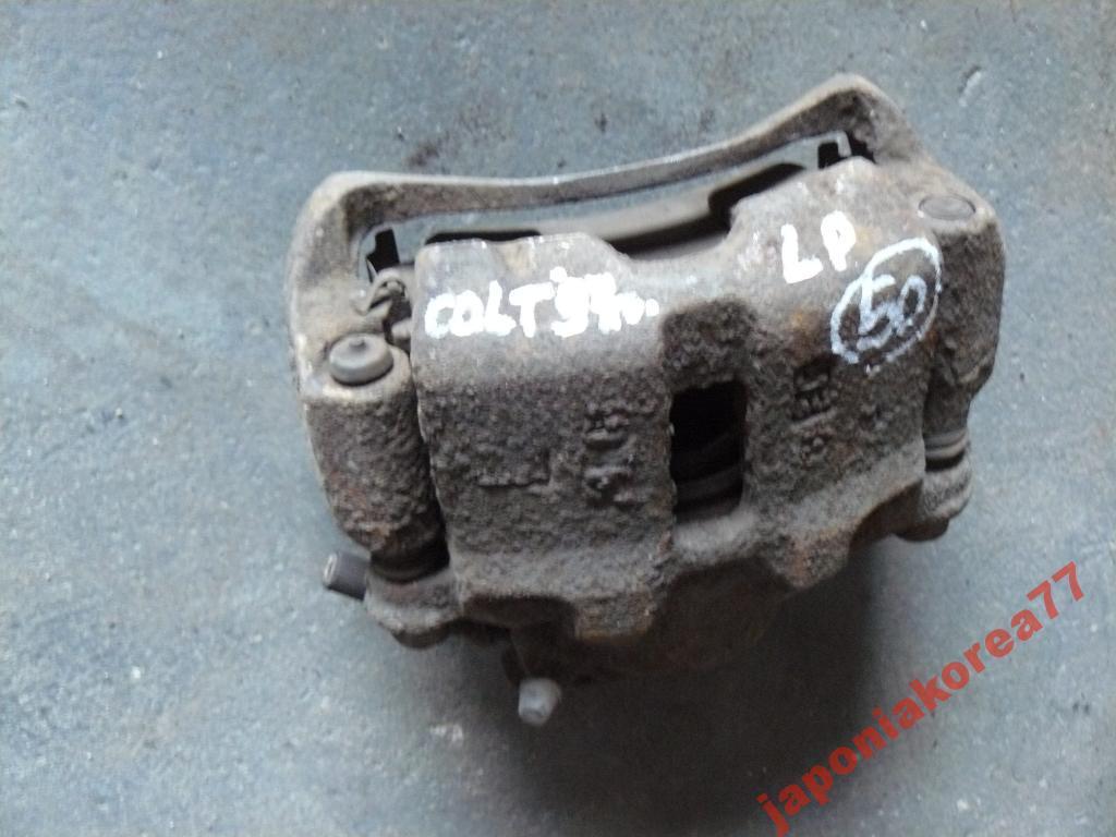 Mitsubishi Colt 1997 Zacisk Hamulcowy Lewy Przód