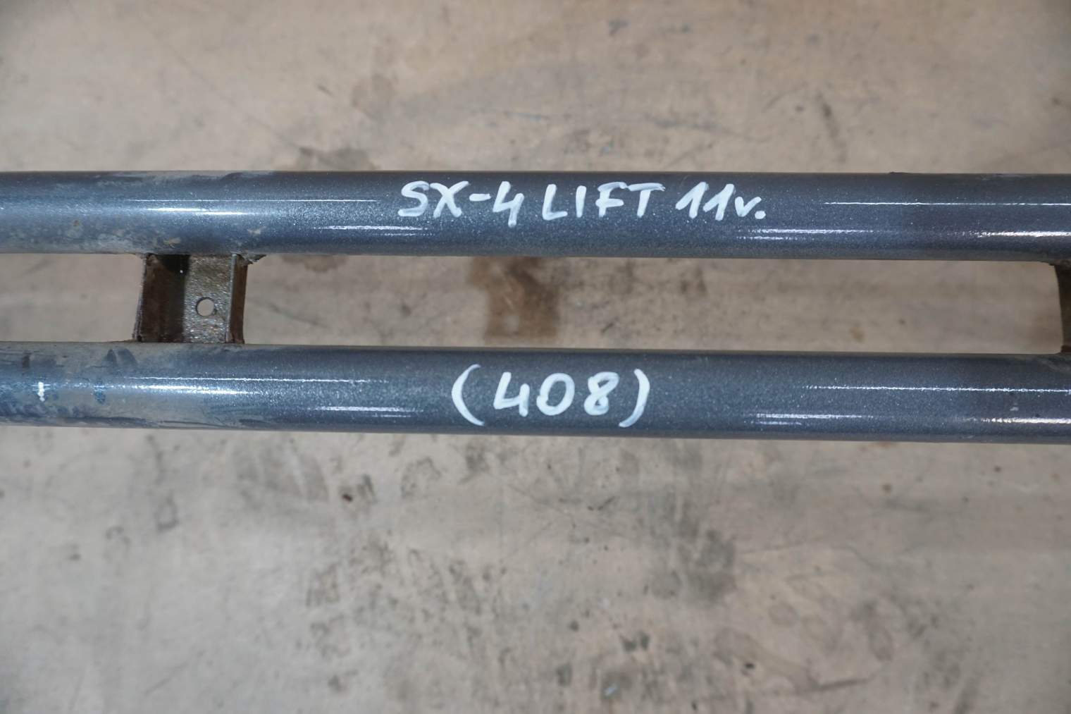 SUZUKI SX4 SEDICI TYLNA BELKA ZDERZAKA 65563-79J