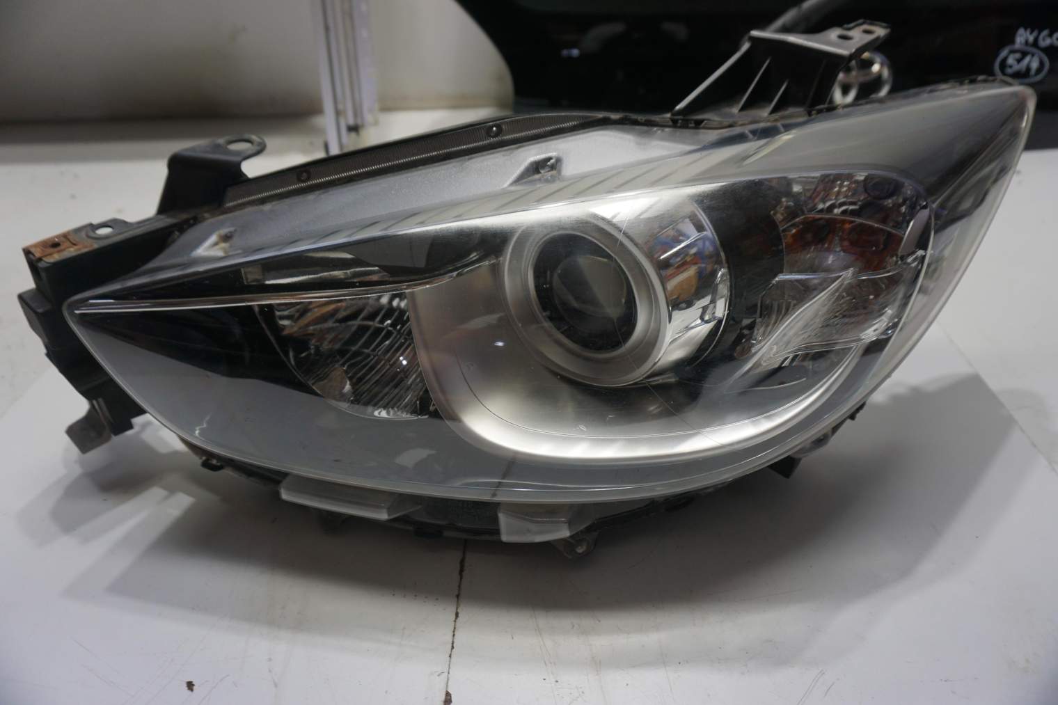 MAZDA CX-5 LAMPA PRZEDNIA LEWA KD77 61 040D